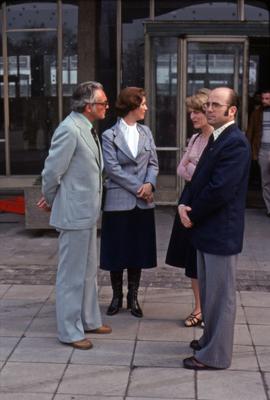 Iona Campagnolo standing with three unknown people in East Germany