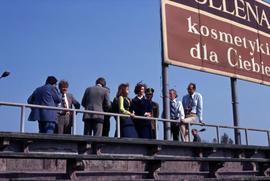 Iona Campagnolo with unknown group on a bridge in Poland