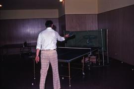 unknown man playing solo ping pong
