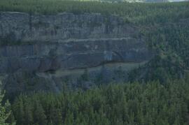 Interbedded basalt flows and glacial fluvial deposits exposed on south side of Stikine River