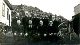 W.E. Collison posing with other clergy at Metlakatla, BC
