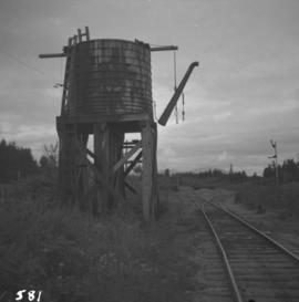 A water tower on rail line