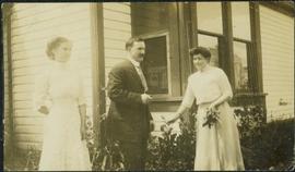 Unknown Family in Front Yard