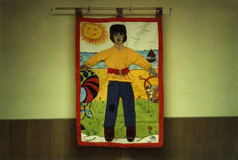Queen Charlotte City community hall tapestry "Boy on Beach"