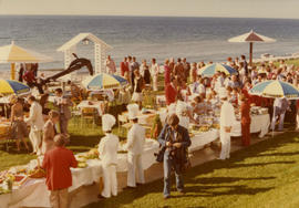 Overview of an outdoor seaside buffet in Nova Scotia attended by Campagnolo and Trudeau