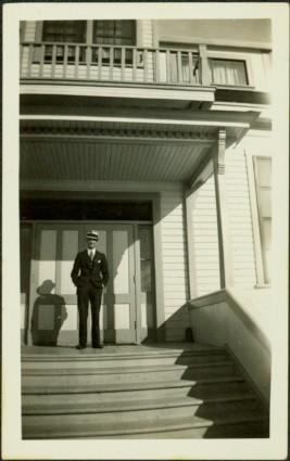 H.F. Glassey at Government Building in Atlin, BC