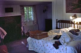 Unidentified woman sleeping on bed in Lake Placid, NY