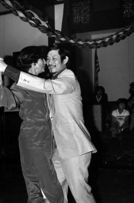 Iona Campagnolo dancing with an unidentified Chinese-Canadian man at Chinese New Year event