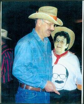 Bridget Moran & Mike Harcourt wearing Cowboy Hats