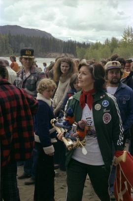 Iona Campagnolo holding rafting figurines in a crowd of Kitimat constituents at Delta King Days rafting event
