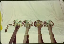 Closeup of four sword hilts of the Royal Irish Constabulary