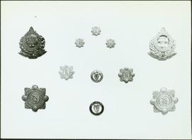 Closeup of framed badges of the An Garda Síochána