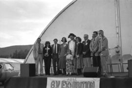 Iona Campagnolo, Cyril Shelford, Grace McCarthy and others on stage at the Bulkley Valley Exhibition