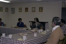 Iona Campagnolo speaking at a table with Masset Liberals at a meeting at the Lions Club in Masset