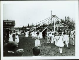 Young Girls dancing a May Pole in Prince George, BC