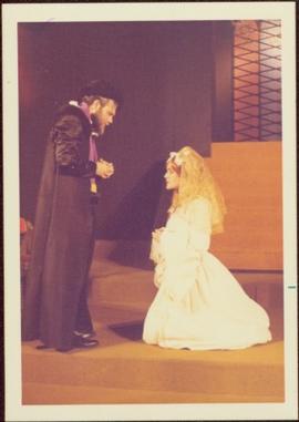 May Diver in Costume as Mary Stuart, kneeling before unidentified man