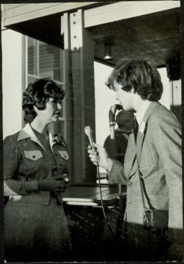 Iona Campagnolo being interviewed by a young male reporter