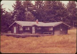Brown wooden house where the Trudeaus stayed during their visit?, Tlell, Haida Gwaii, 1976