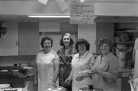 Iona Campagnolo, Hilde Voss, Martha Wallenborn, and Vivian Cousins at a pancake breakfast in Cassiar