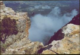 CUSO Mission in Angola - Cliffs above unknown community, clouds below