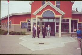 Chancellor's Tour - Iona Campagnolo in group outside the Tumbler Ridge Town Hall