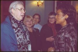Four unidentified women speak with Governor General Michaëlle Jean