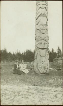Bertha Collison and Josie Edenshaw at totem pole in Masset, Queen Charlotte Islands, BC