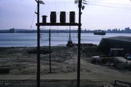 Power poles by harbour