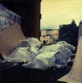 Broken package of asbestos on truck