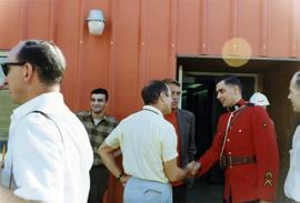 Prime Minister Trudeau shaking hands with an RCMP constable