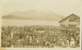 Crowd and band gathered by the water, Prince Rupert BC