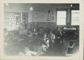Division II children sitting at their desks at Giscome School
