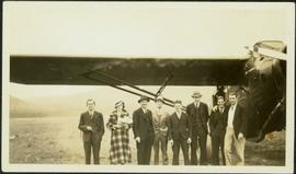 H.F. Glassey in Group by Airplane