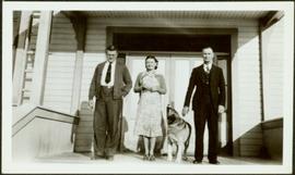 H.F. Glassey with Couple at Main Doors