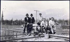Group of men on a railway handcar