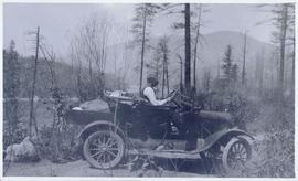 Man driving an automobile