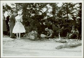 Princess Margaret watching a prospector pan for gold