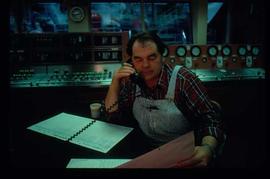 Pulpmill - General - Man on phone in control room