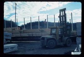 Shelley Sawmill - General - Forklift loading railcar with export lumber to Europe (?)