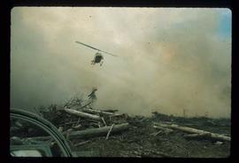 Woods Division - Fire - Helicopter flying through smoke