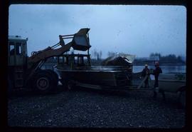 Woods Division - Riverboat Operations - Loading boats on trailers