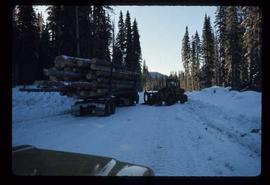 Woods Division - Hauling - Unloading fully loaded trailer
