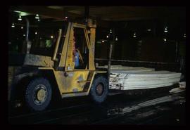 Houston Sawmill - General - Forklift in planer taking graded lumber to wrapping area