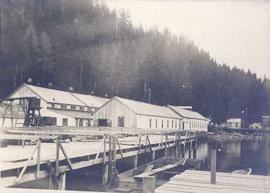 Cannery on pilings, with other cannery buildings in the background