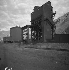 Disused coaling stage beside track at Spences Bridge