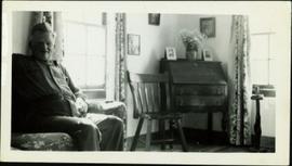 Knox McCusker sitting in his living room