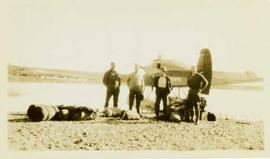 Four men leaving Stuart Lake by sea plane