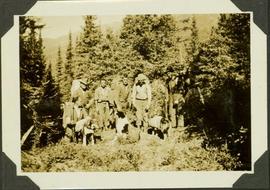 Group photo of survey crewmen and pack dogs back packing up Wrede Creek