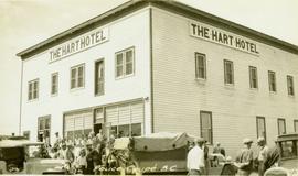 Bedeaux's Party parked in front of the Hart Hotel in Pouce Coupe, B.C
