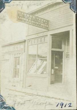 Storefront of Harry G. Perry Tailor shop